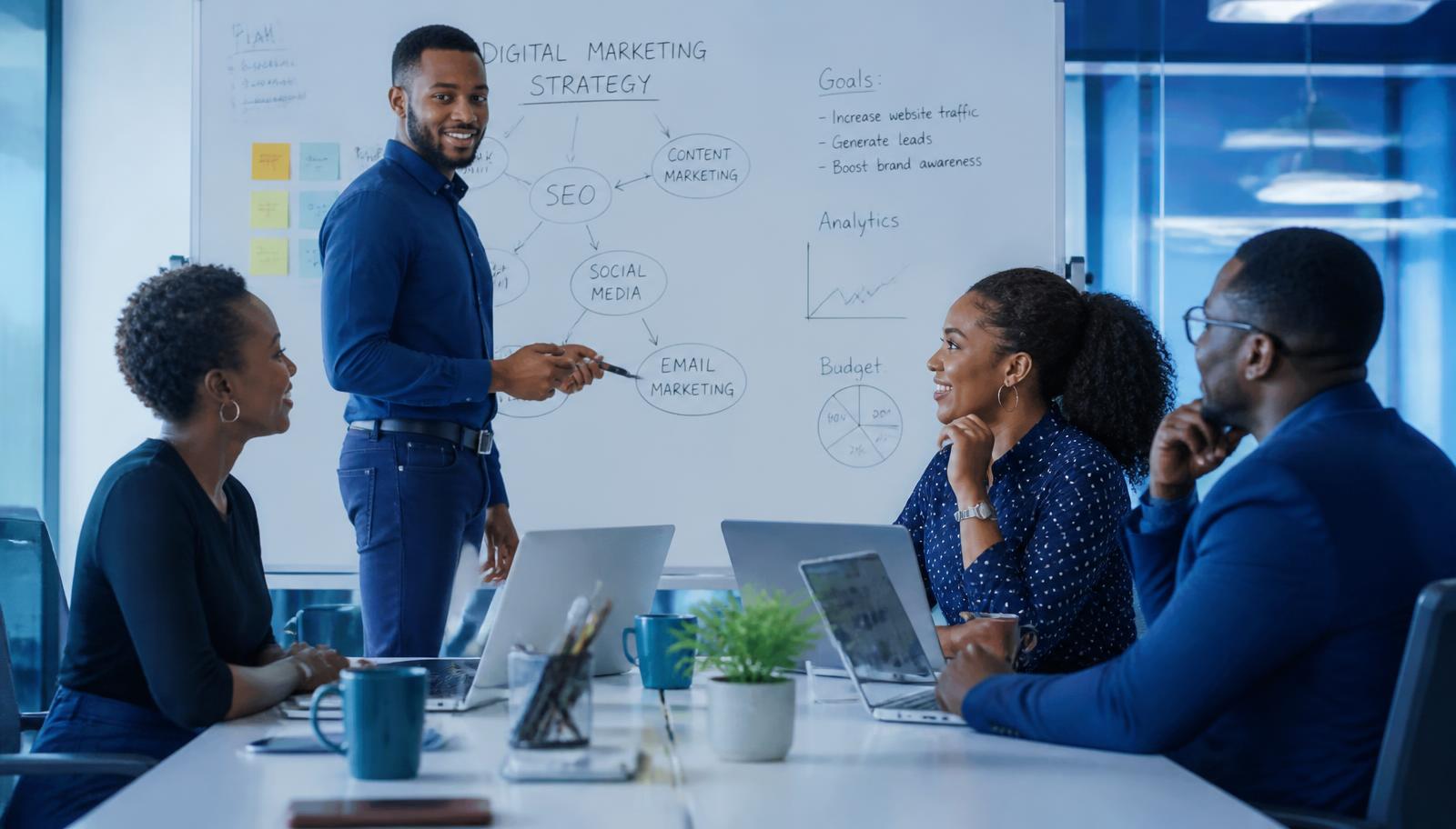 African digital strategy professionals collaborating in a modern office